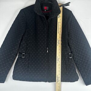 Quilted black jacket. Good staple piece. Made well with a classy look.